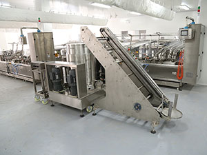 Sistema de Transporte y Vertido de Crema para Galletas